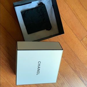 Chanel box empty and a small dust bag.